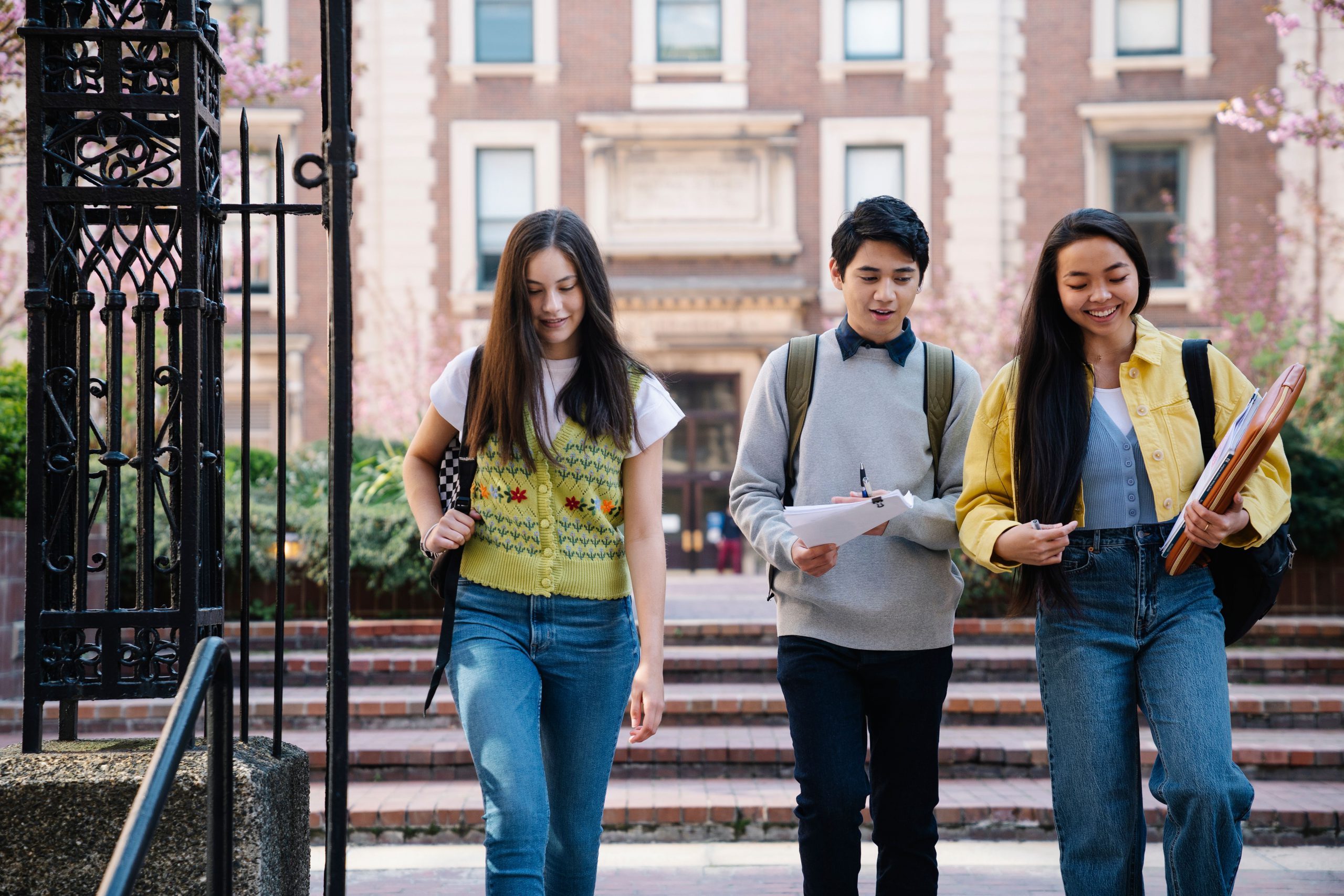 3 University students walking and walking